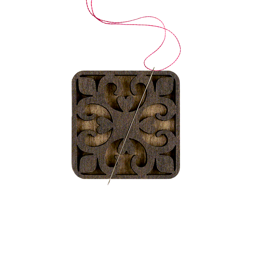Ornate Wooden Needle Minder