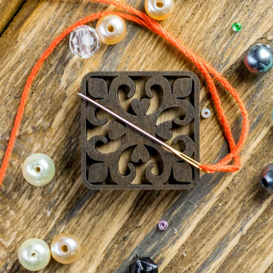 Ornate Wooden Needle Minder